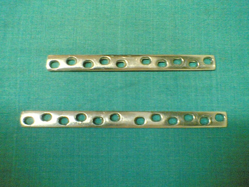 Dynamic compression plates